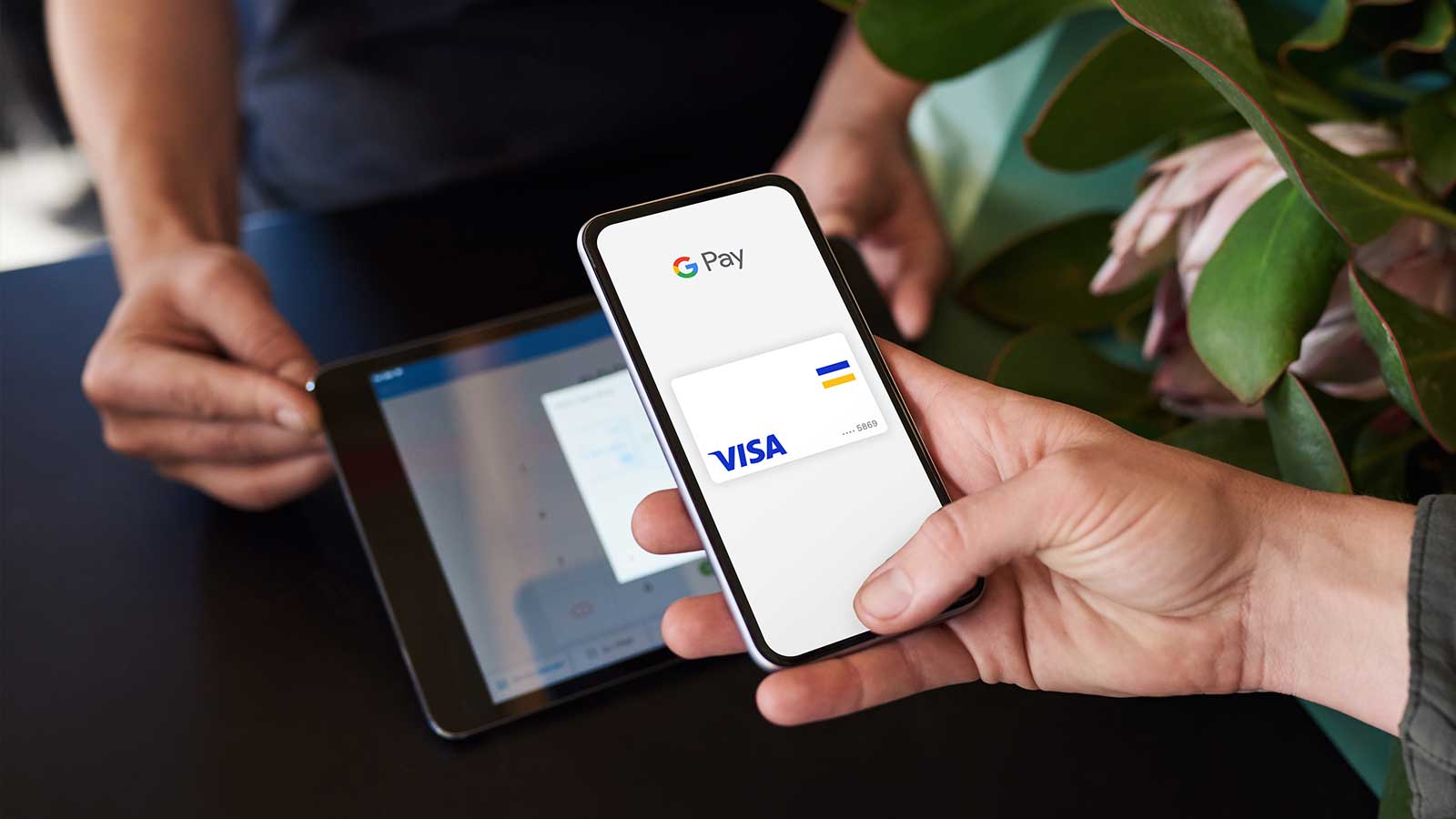 Smart phone displaying Visa Google Pay.